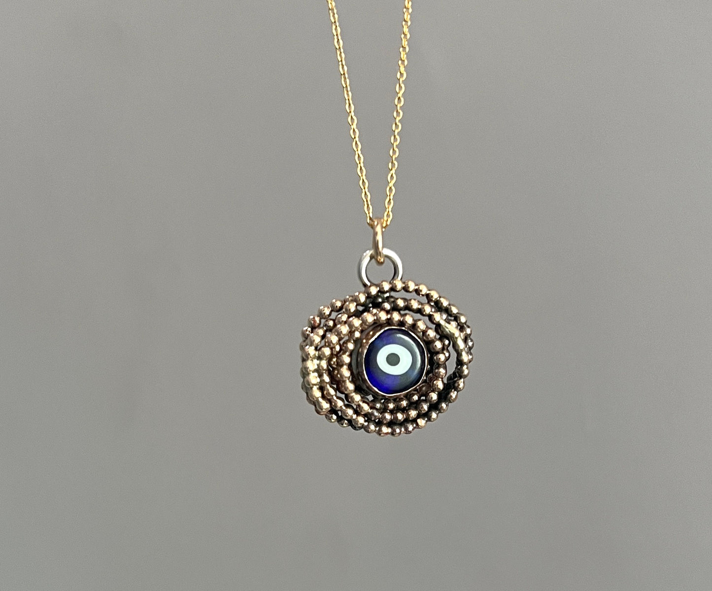 14k gold filled eye nest pendant