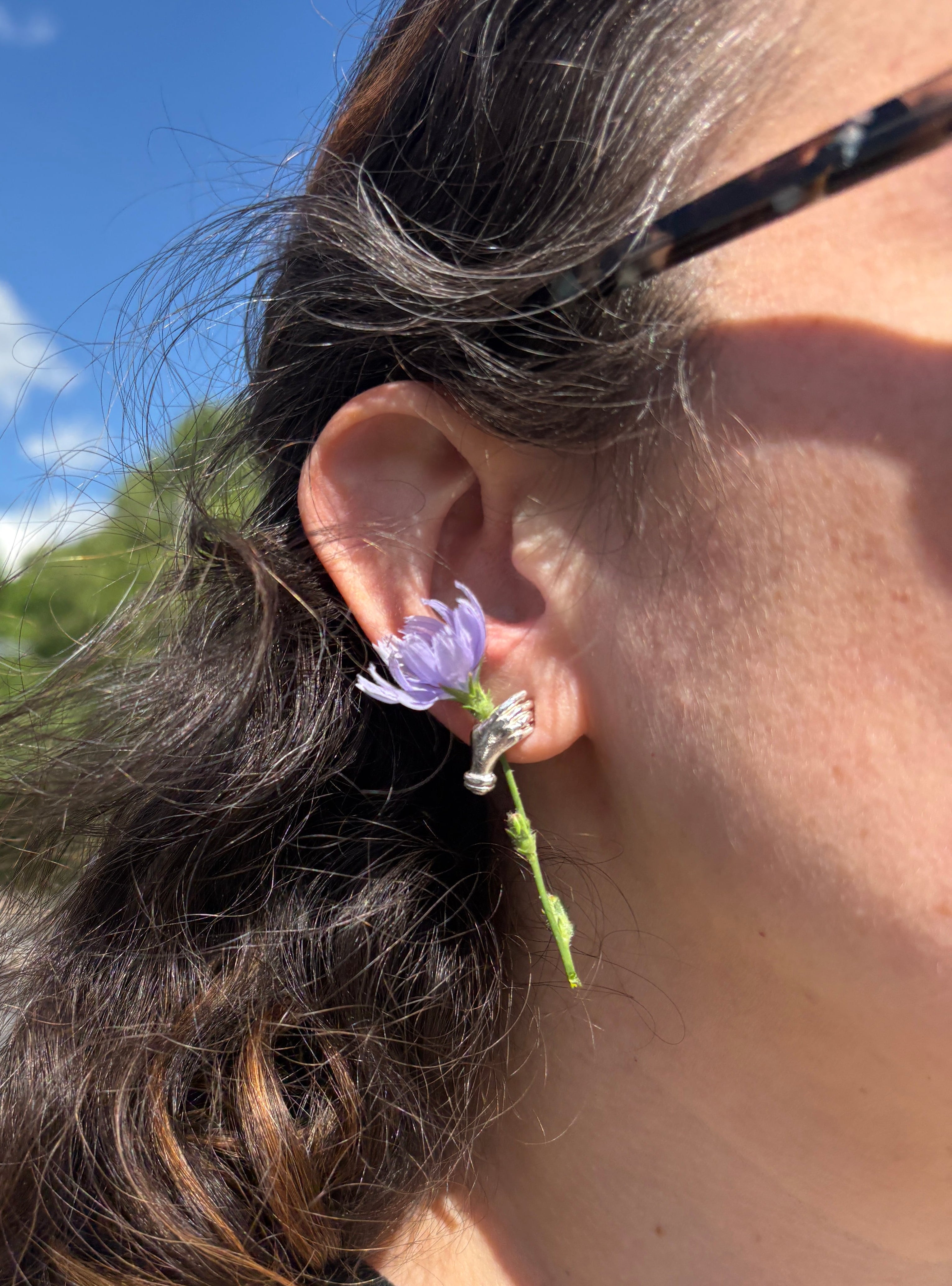 Holding Flowers Hand Studs in Sterling Silver