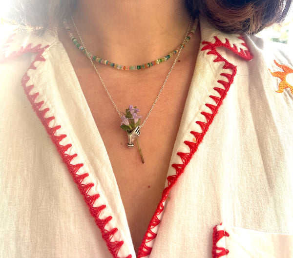 Hand Holding flowers Pendant