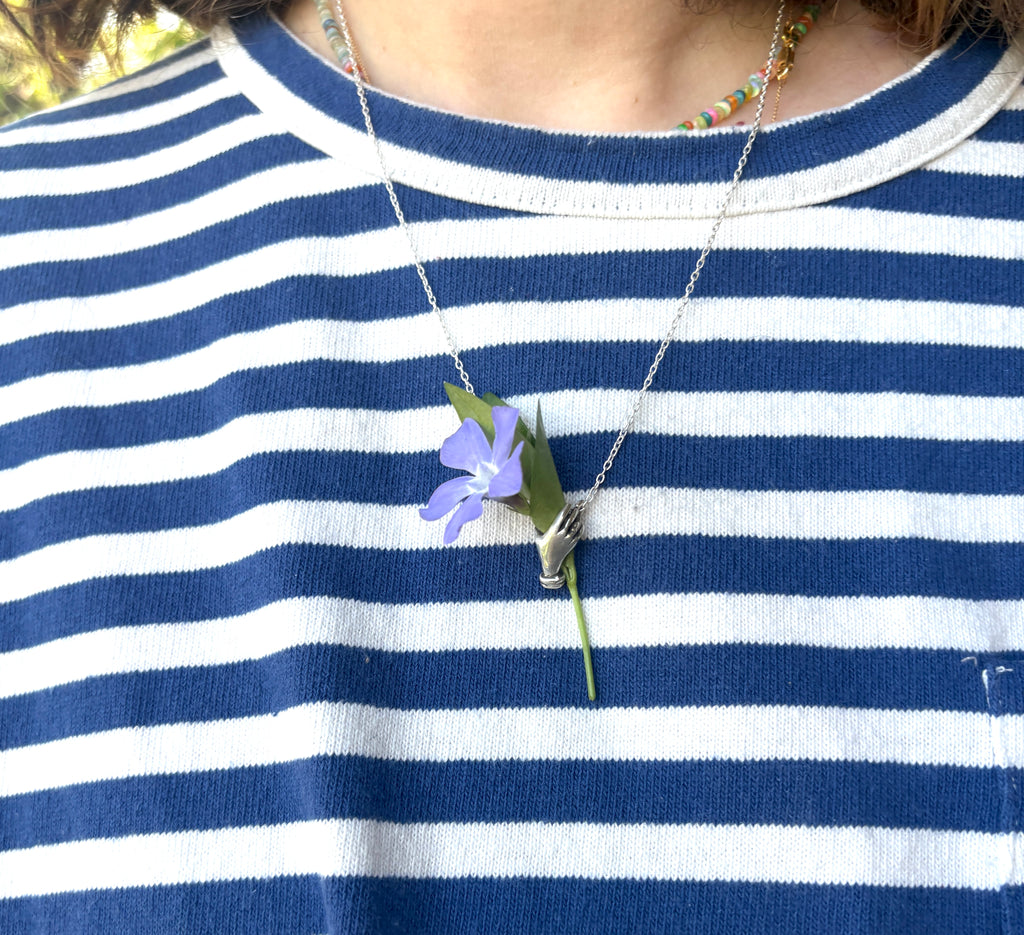 Hand Holding flowers Pendant
