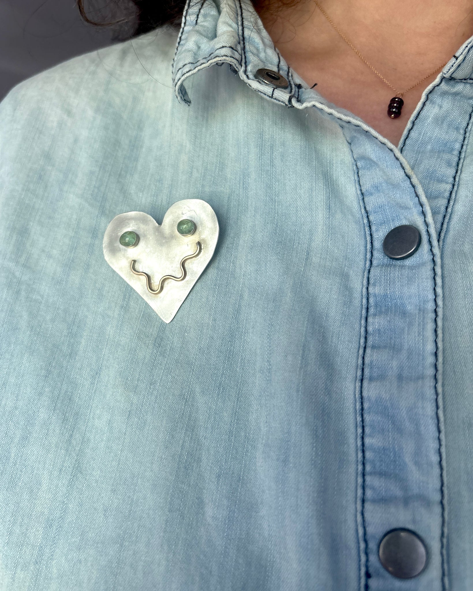 Smiley Heart Pin in Sterling with Emerald Eyes