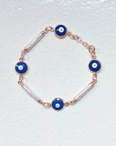 pearl and evil eye linked bracelet