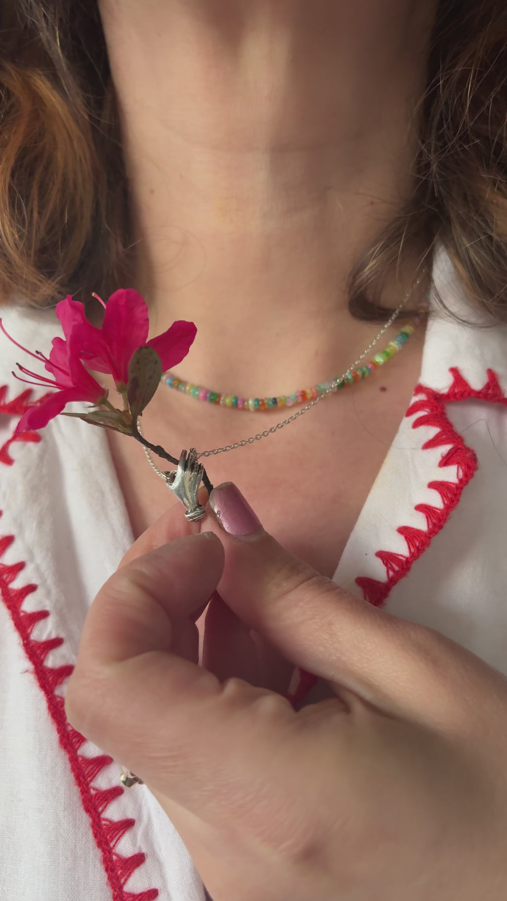 Hand Holding flowers Pendant