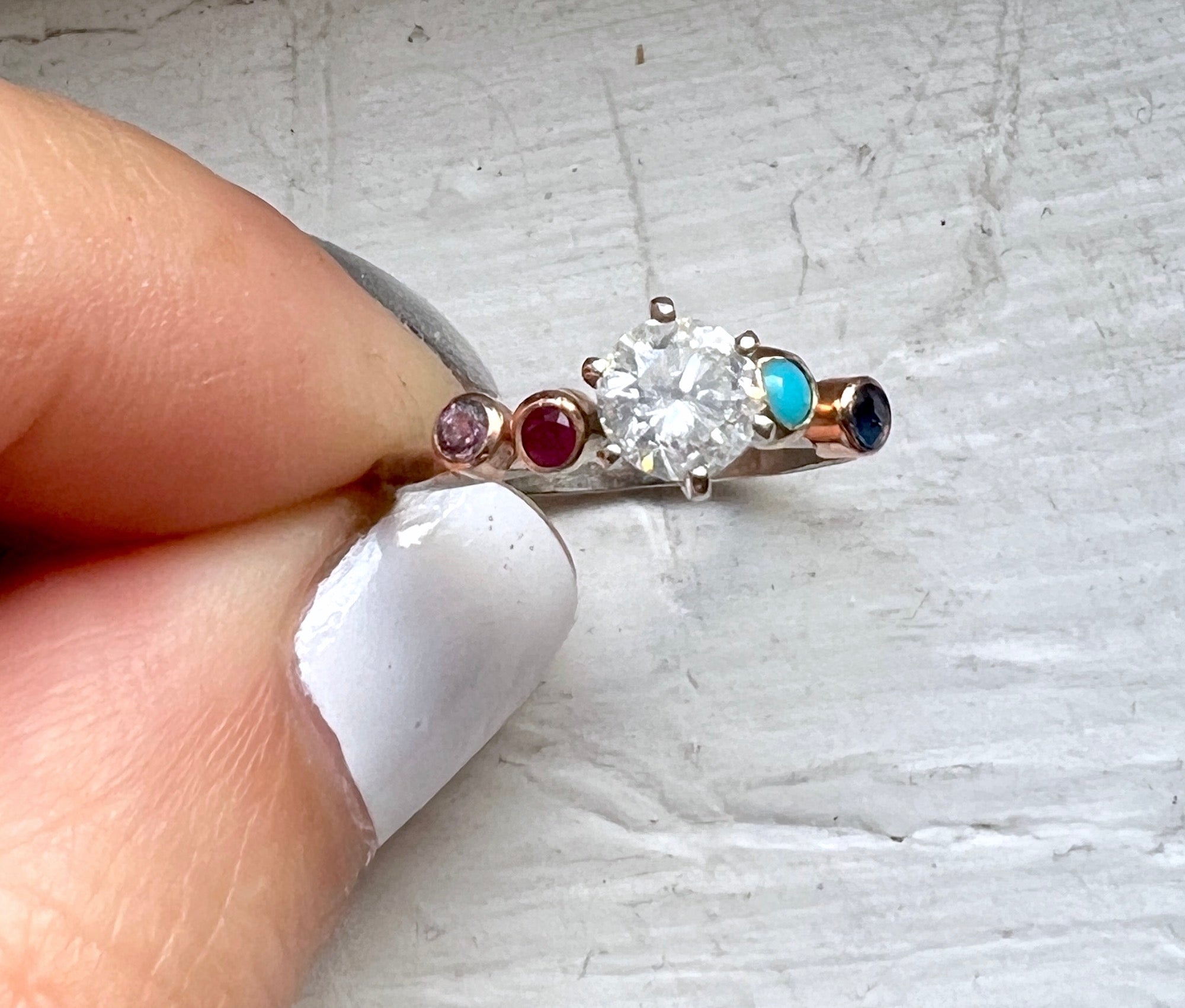 Half carat diamond rainbow wiggle ring in 14k white and yellow gold vintage setting reclaimed diamond ruby turquoise sapphire one of a kind