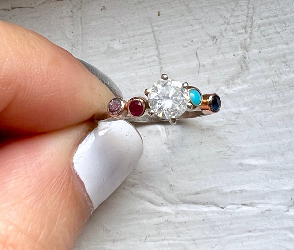 Half carat diamond rainbow wiggle ring in 14k white and yellow gold vintage setting reclaimed diamond ruby turquoise sapphire one of a kind