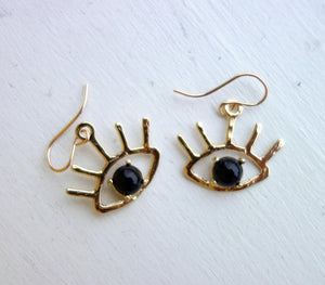 Beholder Earrings: Brass and Black Onyx Eye Dangle Earrings